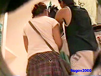 This is the chick in the polka dot skirt that doesnt notice the camera up her short skirt!