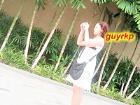 The skillful cameraman noticed this cutie filming the city around her on cam. He came closer and also filmed some great scenes of her naked upskirt