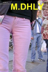 Tight pink pants show a yummy camel toe